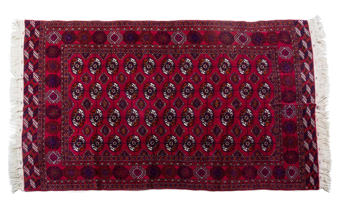 A Russian Bokhara Wool Rug 8 feet 4 inches x 5 feet 1 inch.