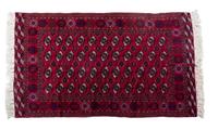 A Russian Bokhara Wool Rug 8 feet 4 inches x 5 feet 1 inch.