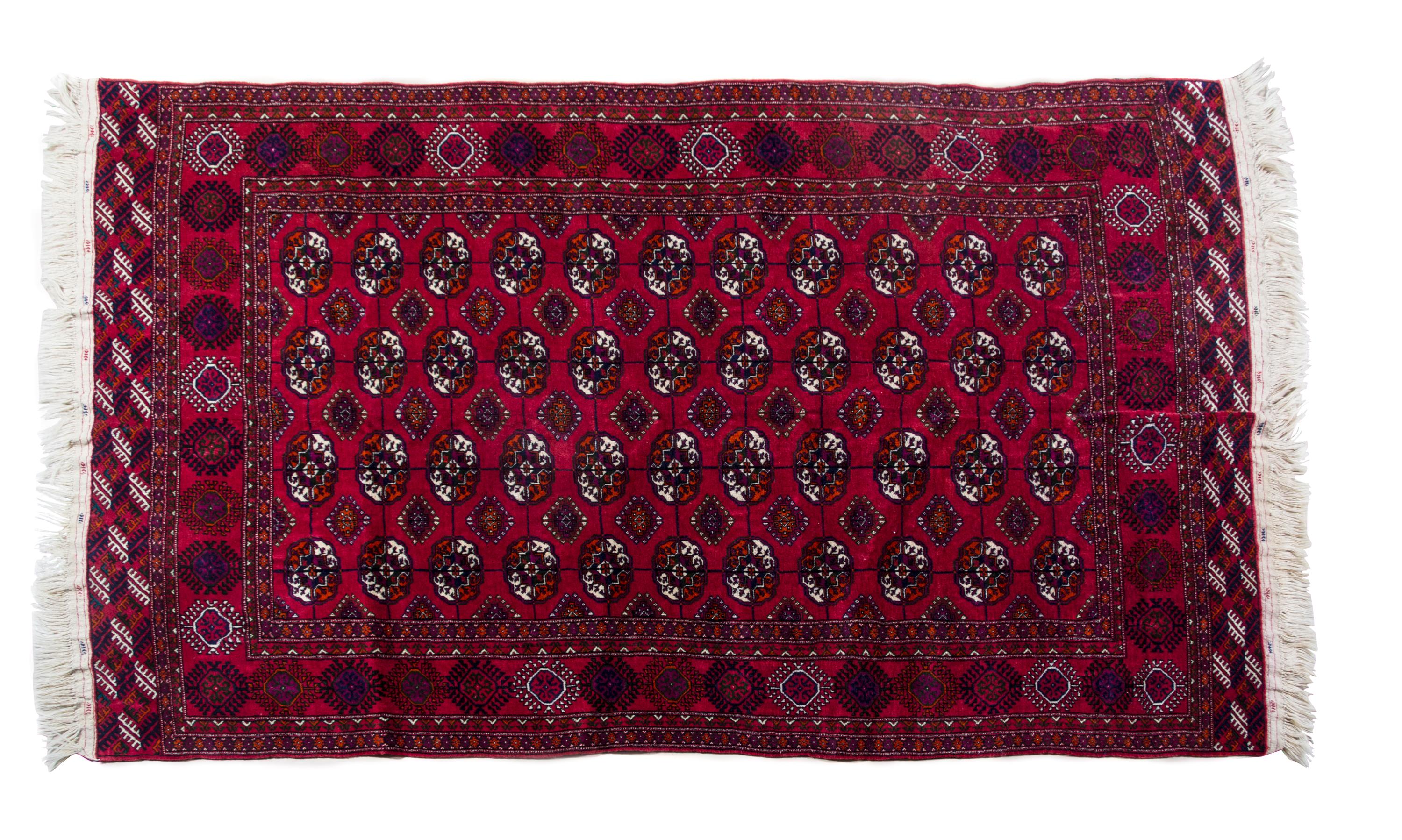 A Russian Bokhara Wool Rug 8 feet 4 inches x 5 feet 1 inch.