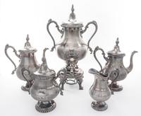 A Meriden Brittania Silver-plate Tea and Coffee Set Height of tallest 18 1/4 inches. — 19TH CENTURY