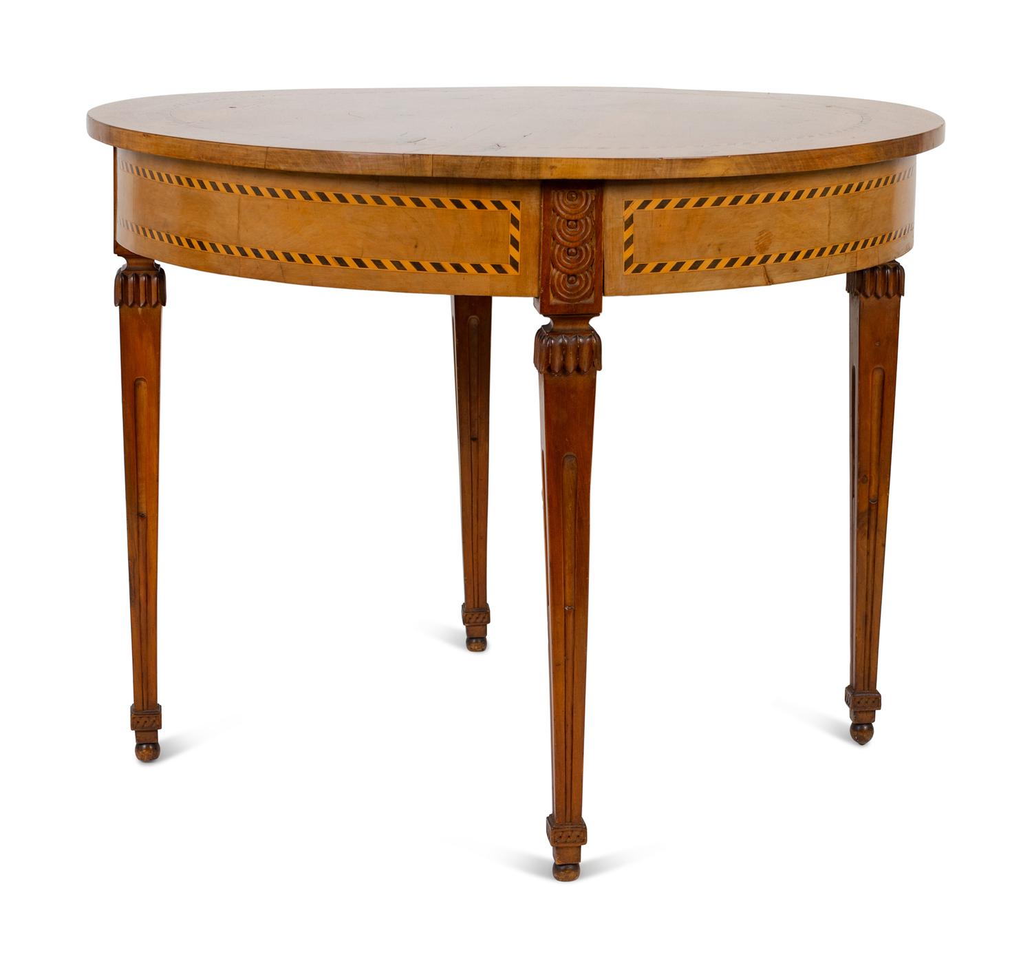A Baltic Neoclassical Style Satinwood and Ebony Inlaid Center Table — EARLY 20TH CENTURY