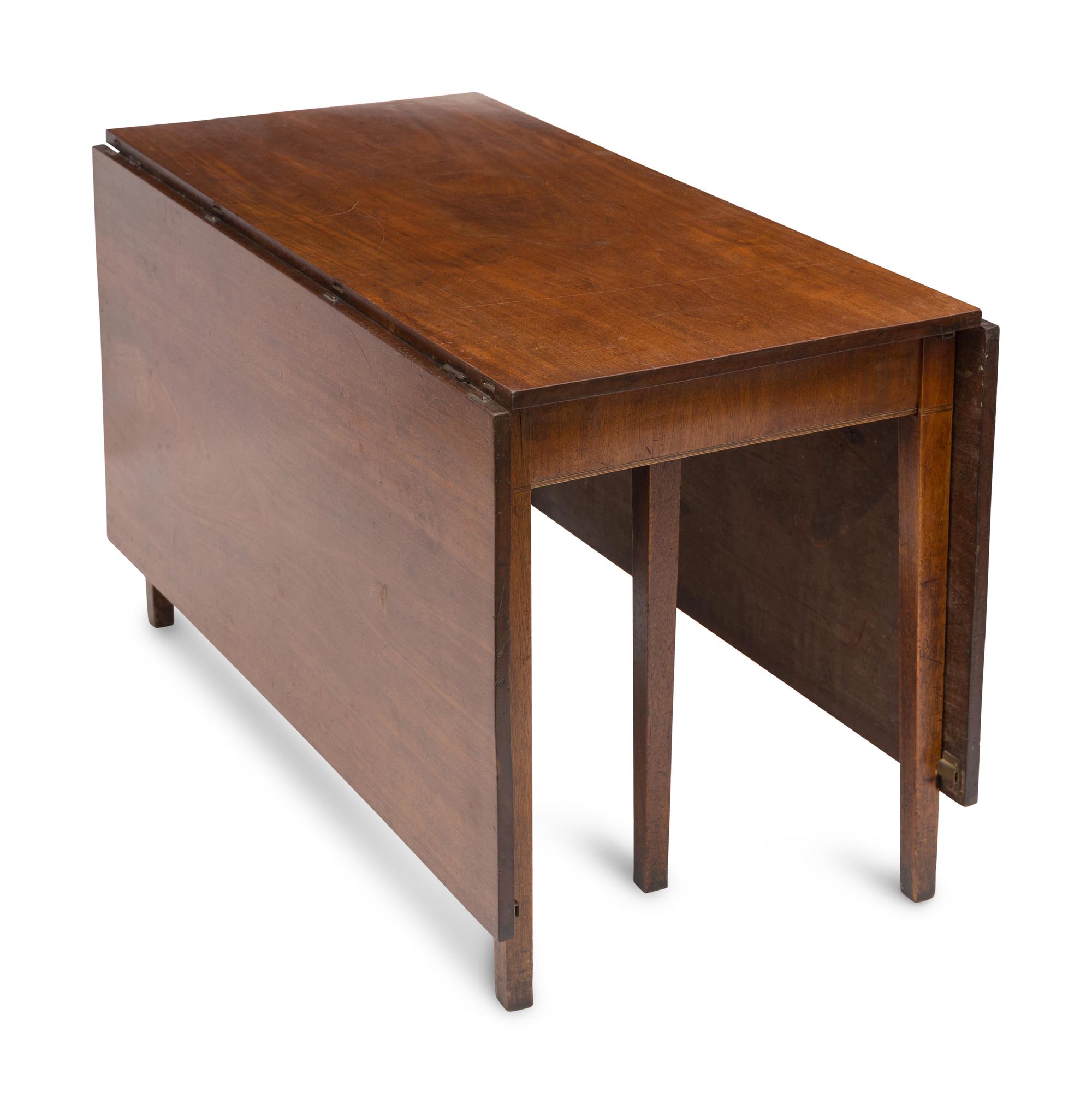 A George III Mahogany Gate-Leg Dining Table