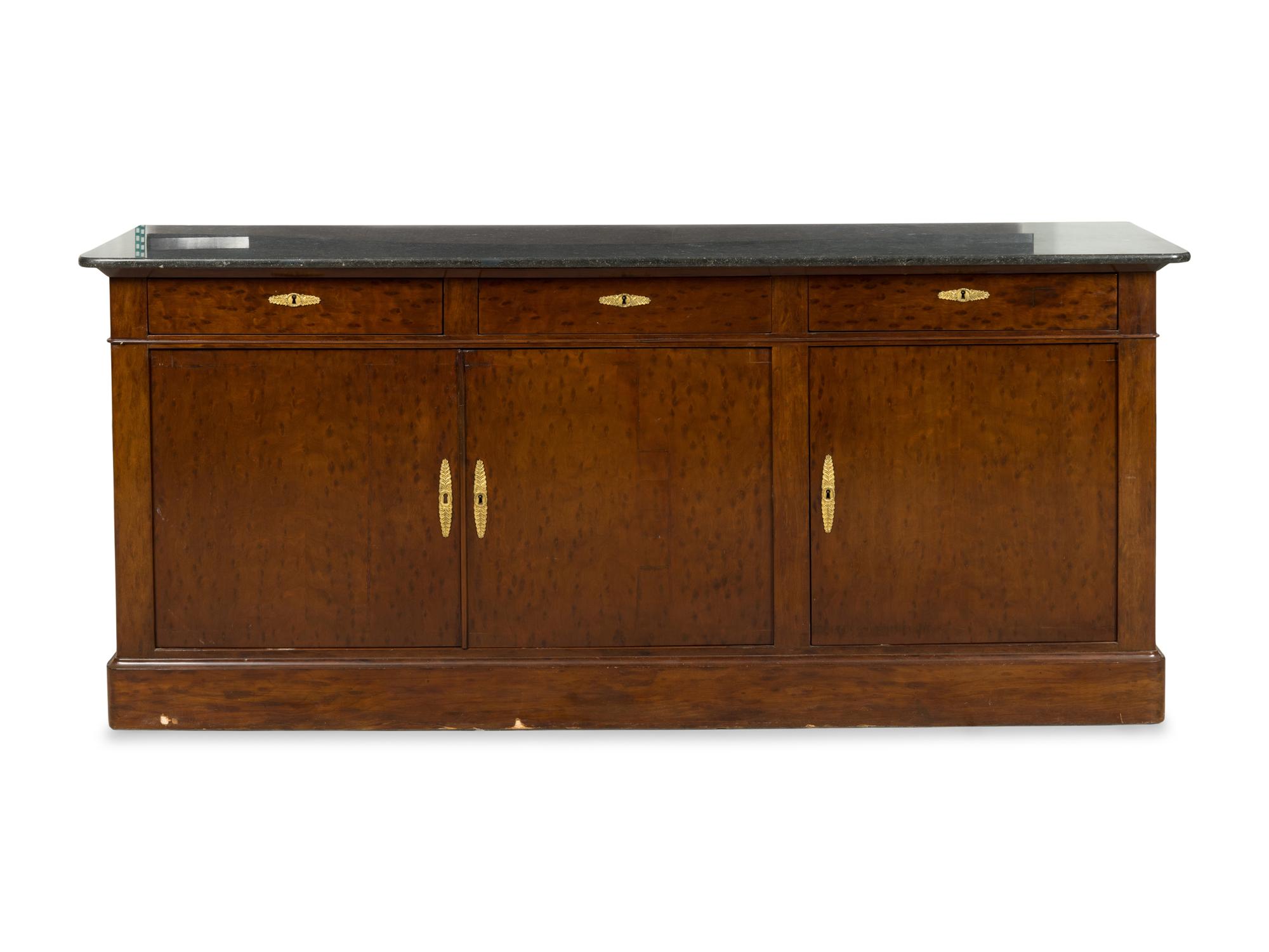 A Louis Philippe "Plum Pudding" Mahogany and Marble-Top Sideboard
