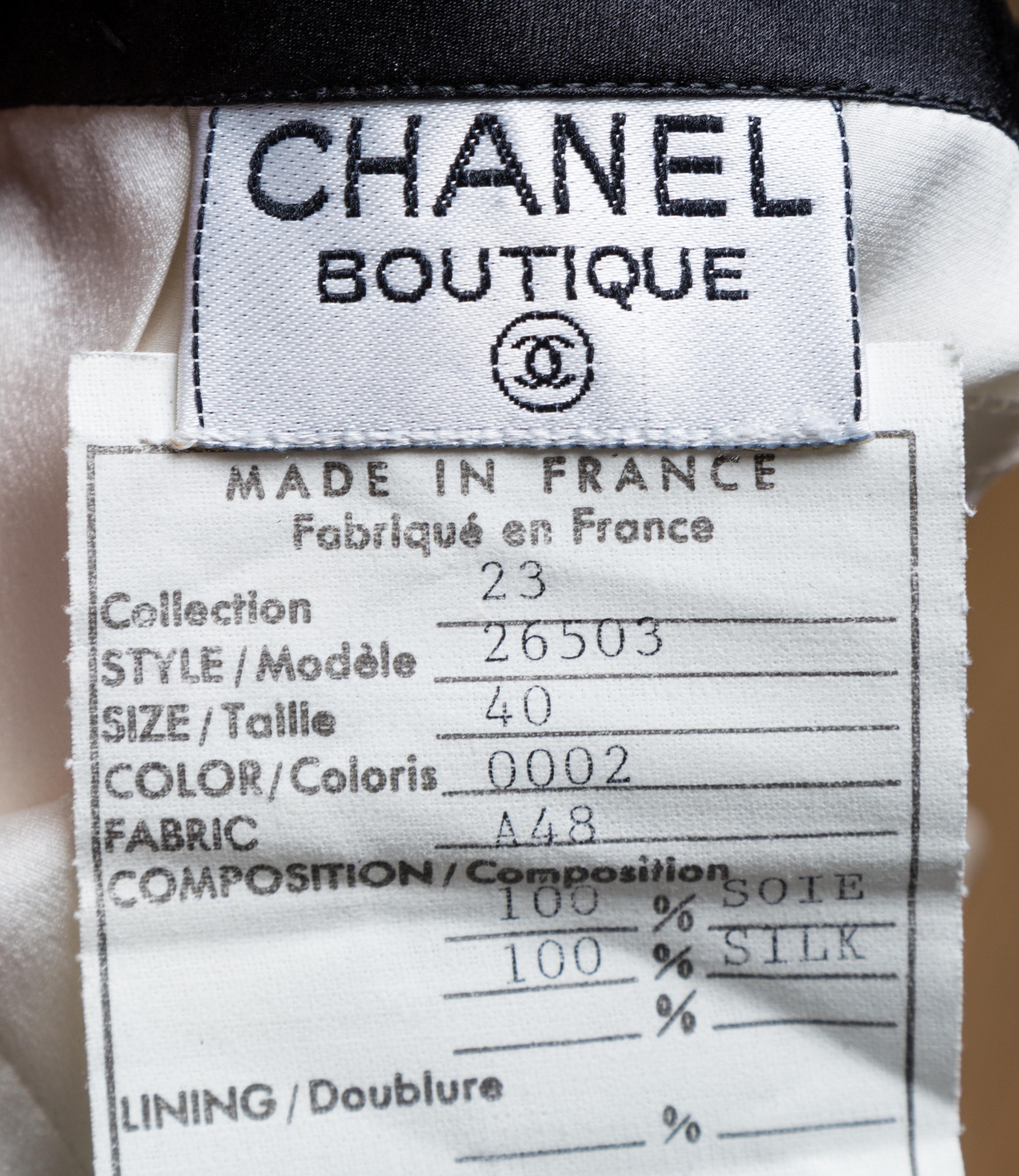 A Chanel Cream and Black Silk Camisole, Size 40.