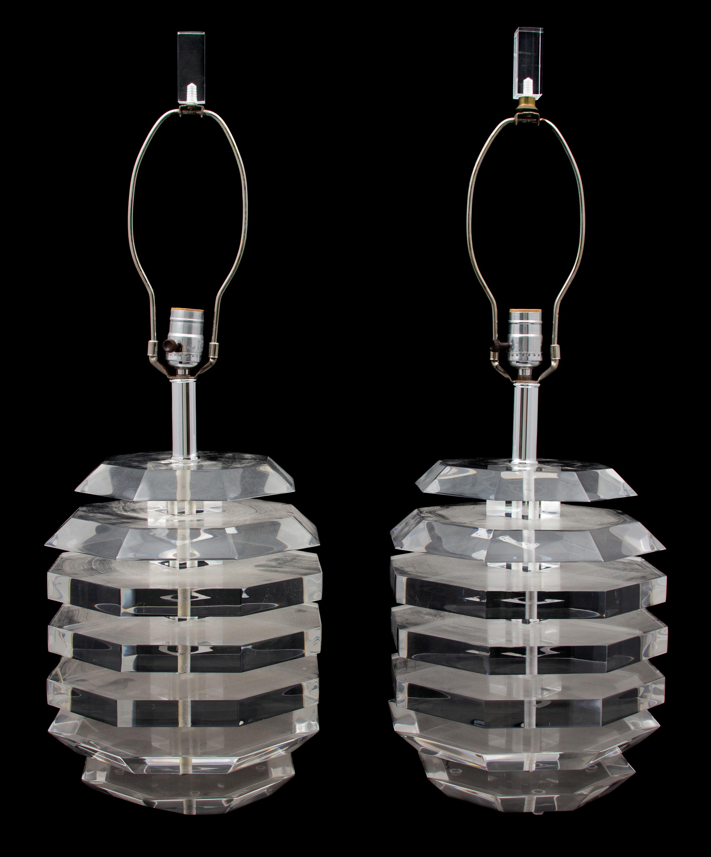 A Pair of Modern Lucite Lamps Height 28 1/2 x diameter 10 inches. — ATTRIBUTED TO KARL SPRINGER, CIRCA 1970