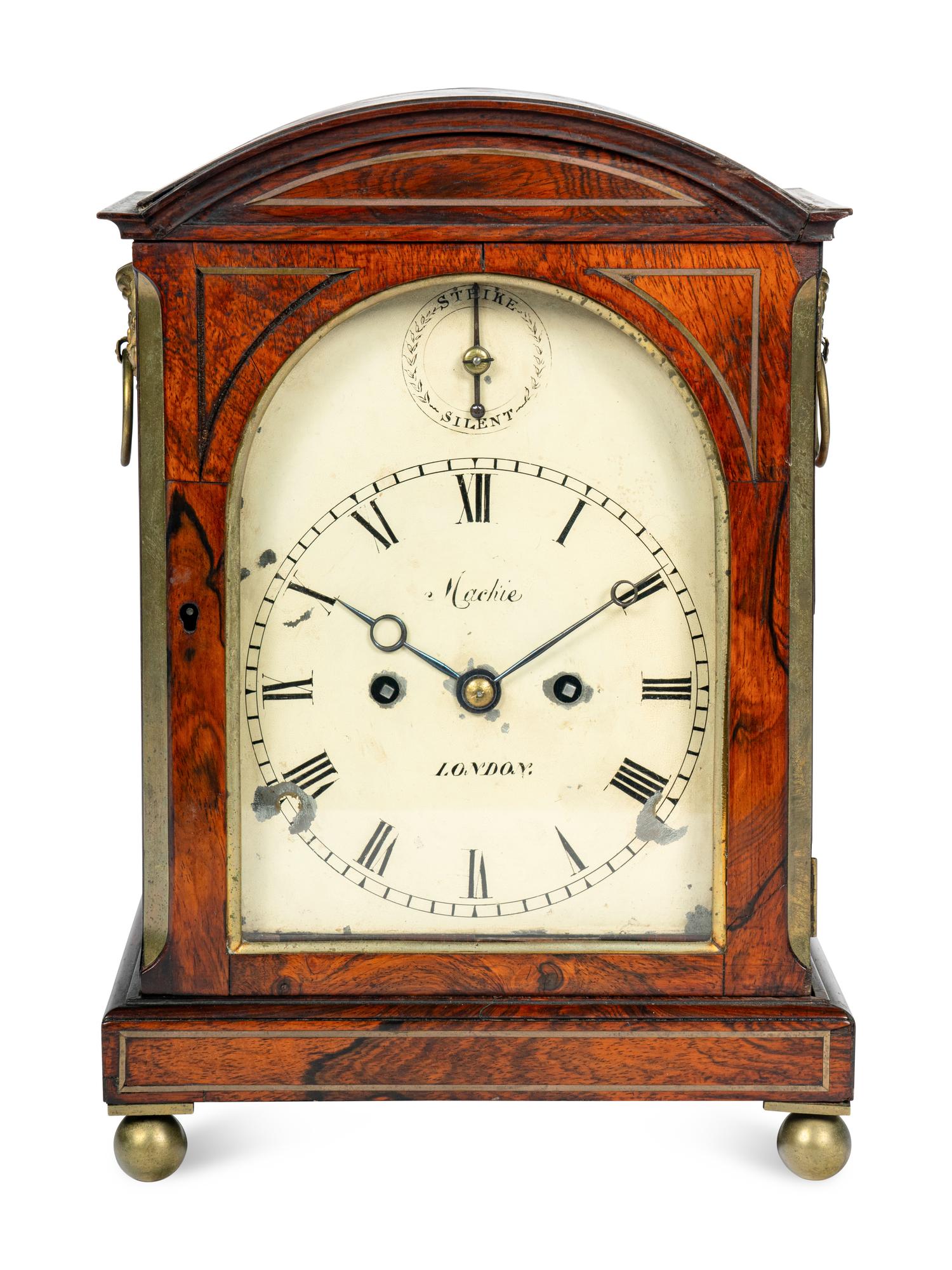 A Regency Rosewood and Brass-Inlaid Mantel Clock