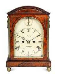 A Regency Rosewood and Brass-Inlaid Mantel Clock