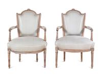 A Pair of Louis XVI Limed Beech Fauteuils