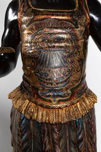 A Venetian Parcel-Gilt and Ebonized Attendant