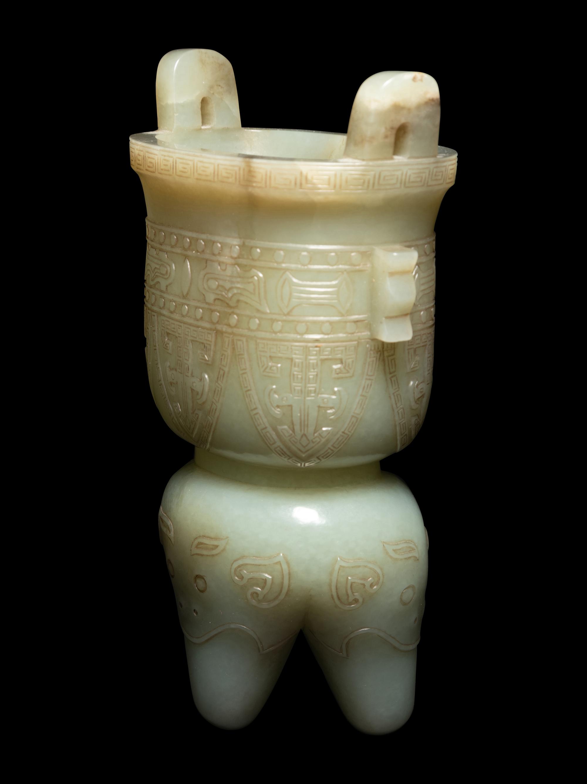 A Russet and Celadon Jade Li -Form Vessel
