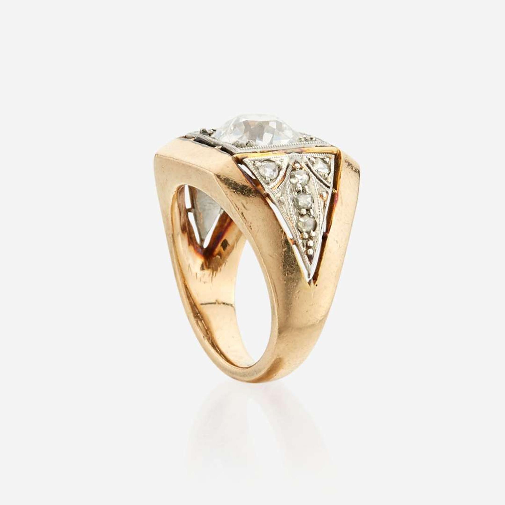 A diamond, gold, and platinum ring