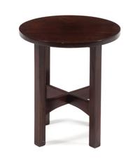 Gustav Stickley, (American, 1858-1942), a mahogany tabouret, model no. 602, having a circular top raised on squared legs joined by stre