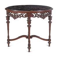 An Italian Carved Walnut Marble-Top Table