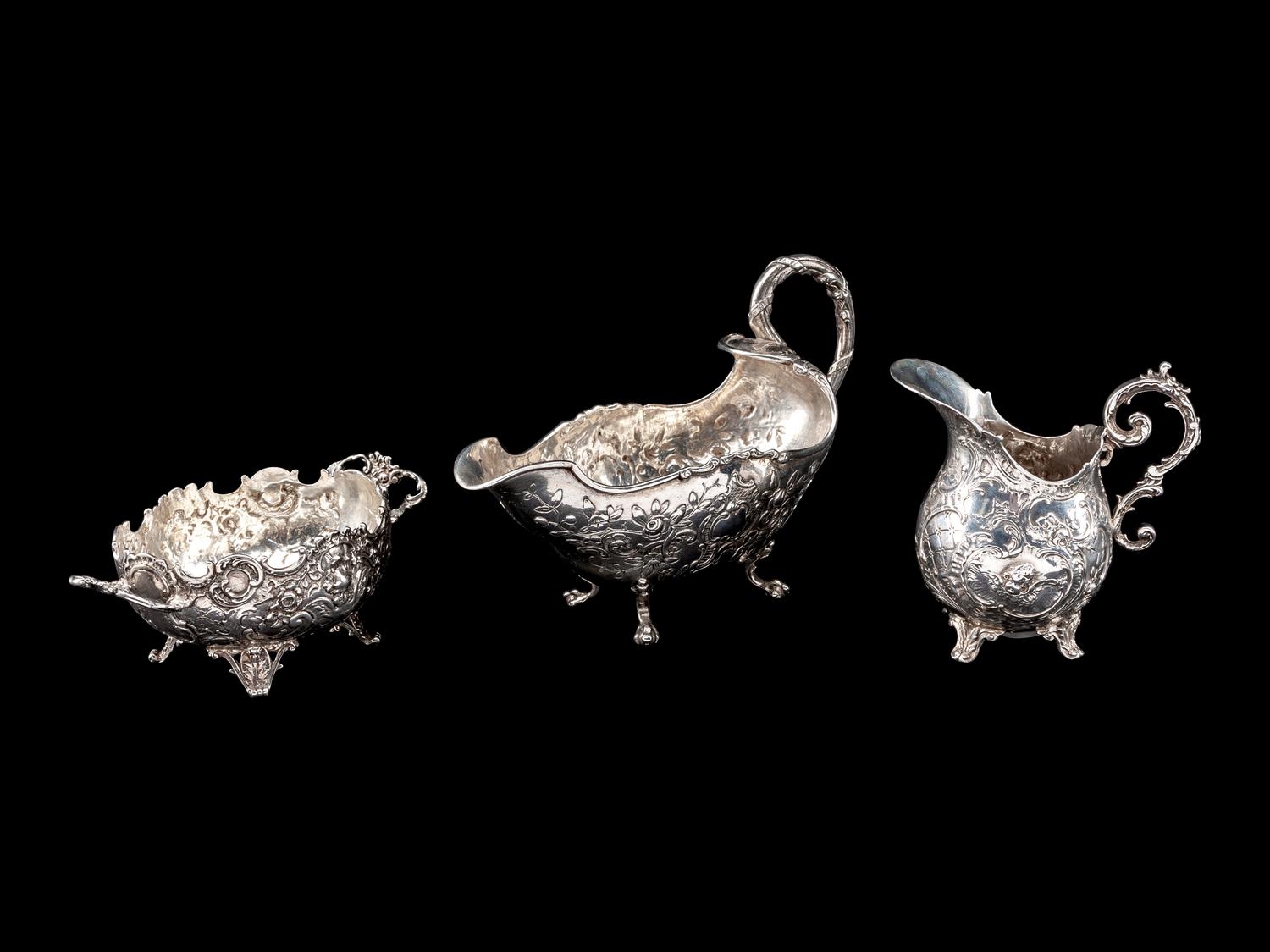 A Group of Three German Silver Table Articles