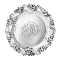 An American Silver Platter, Mauser Mfg. Co., New York, NY, 1900, retailed by Lebolt & Co., of shaped circular form with a bold foliate