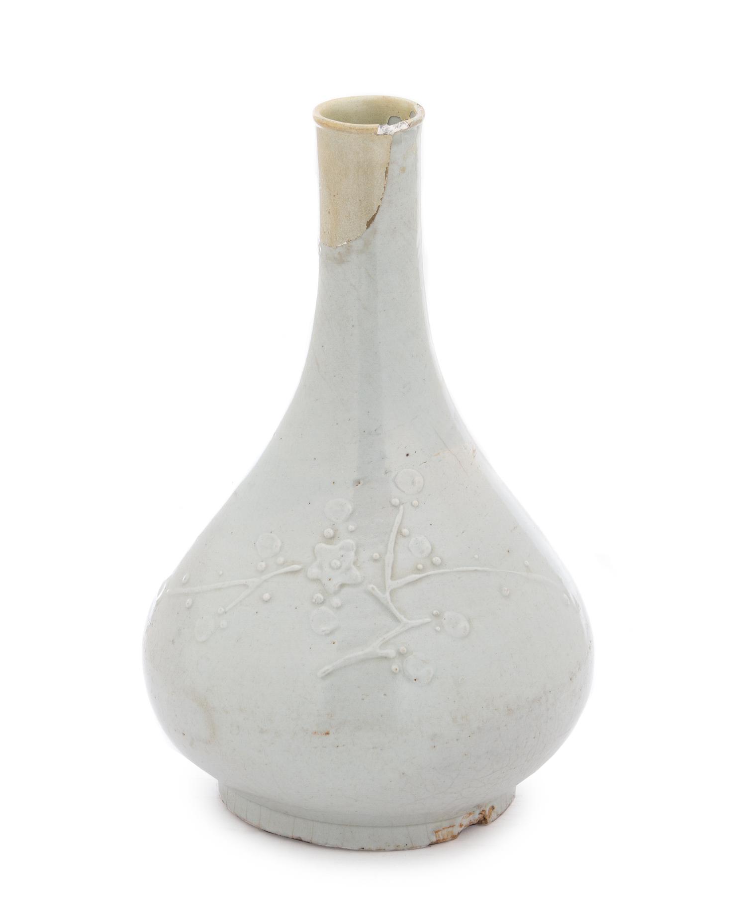 A Korean White Glazed Porcelain Bottle Vase JOSEON DYNASTY Height 12 1/2 inches. — JOSEON DYNASTY
