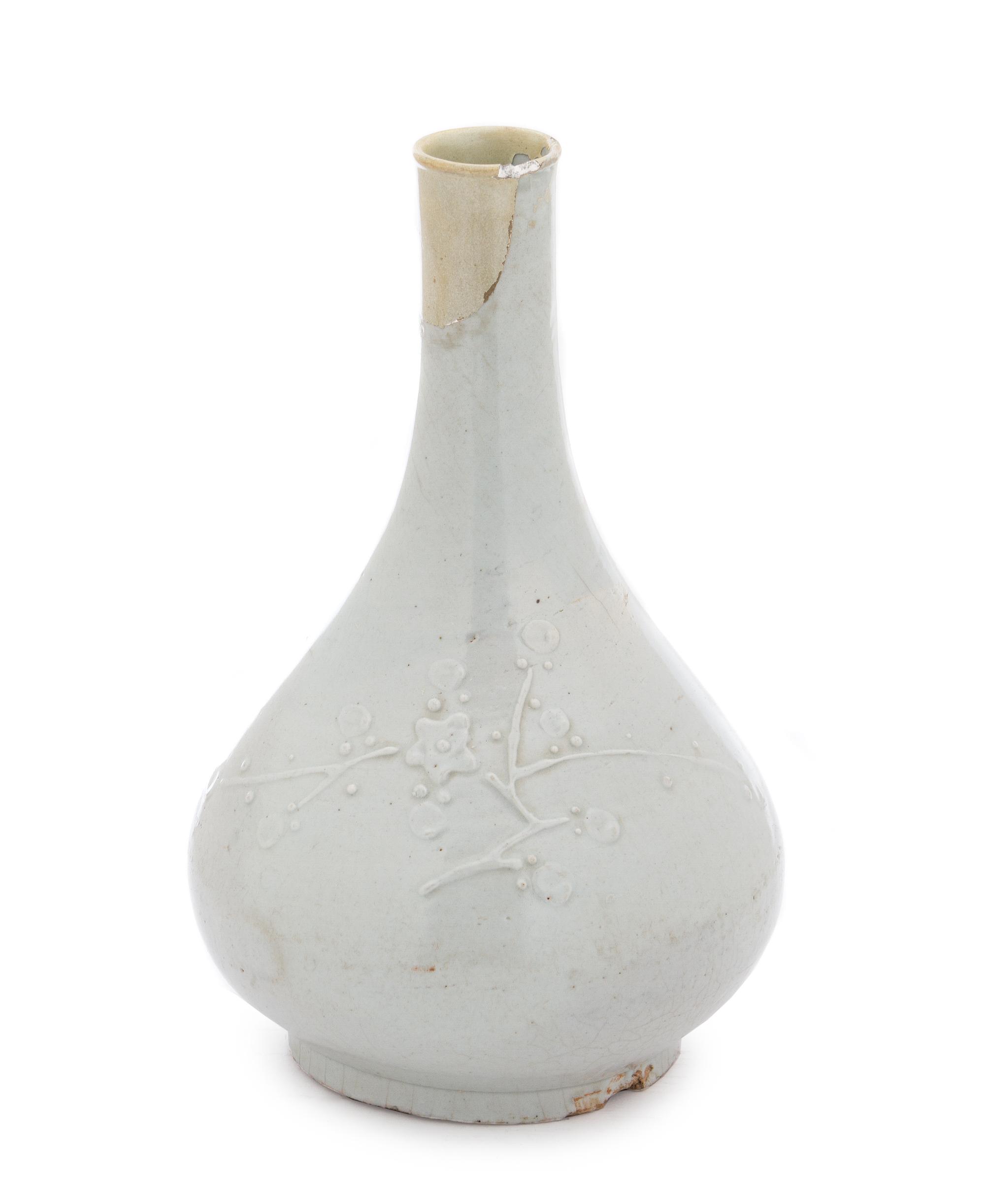 A Korean White Glazed Porcelain Bottle Vase JOSEON DYNASTY Height 12 1/2 inches. — JOSEON DYNASTY