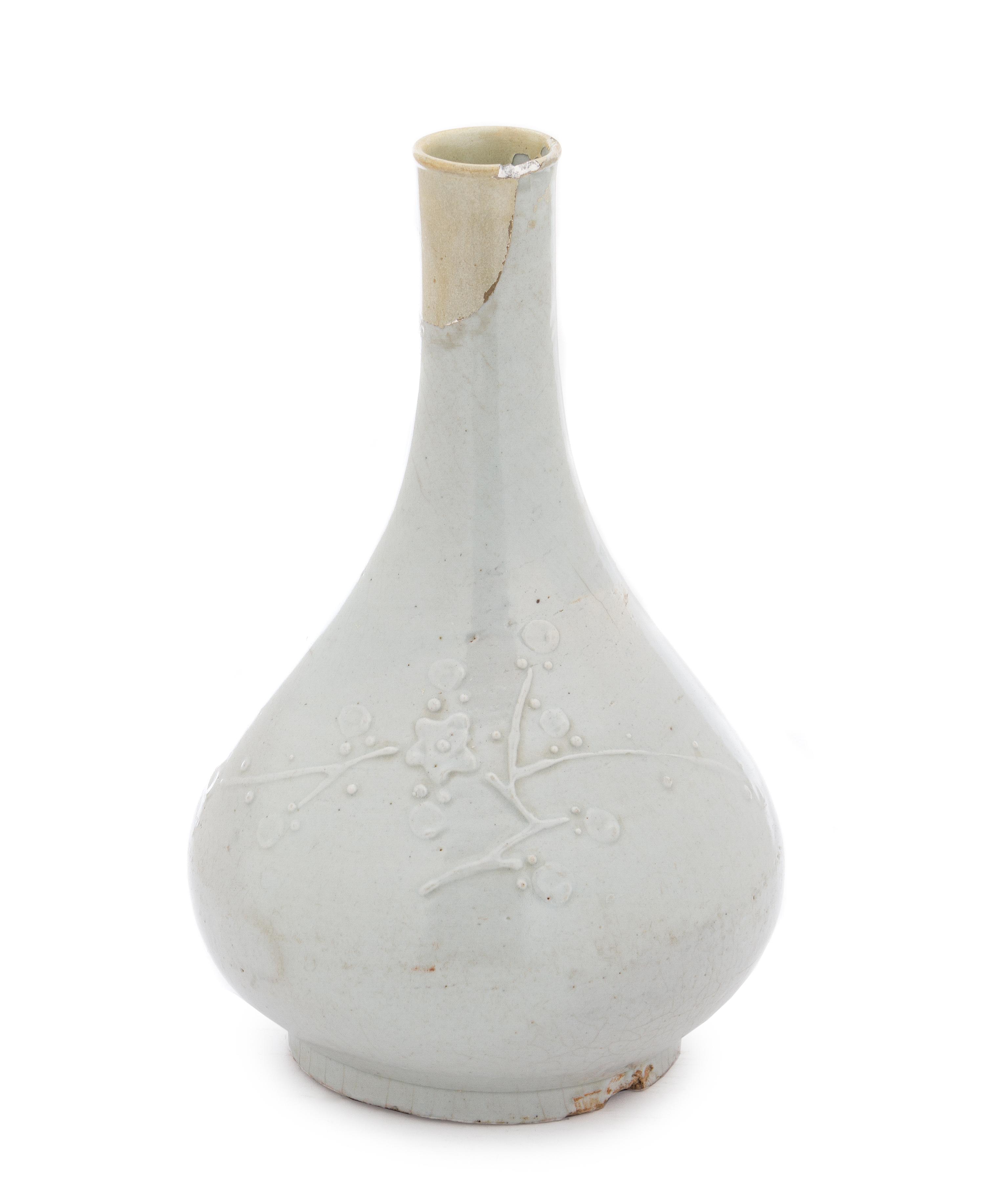 A Korean White Glazed Porcelain Bottle Vase JOSEON DYNASTY Height 12 1/2 inches. — JOSEON DYNASTY
