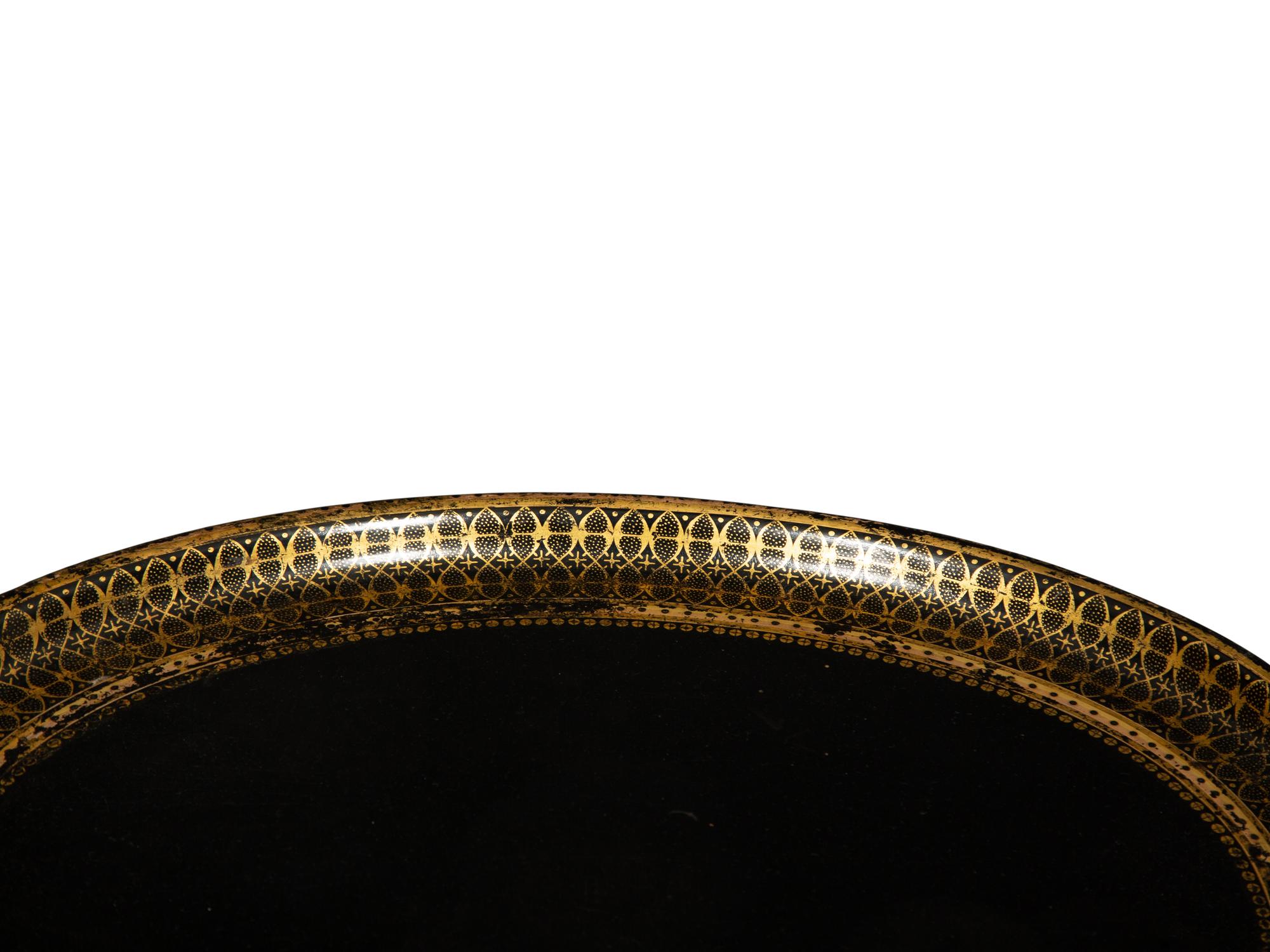 A Regency Style Black and Gilt Decorated Lacquer Tray Top Table