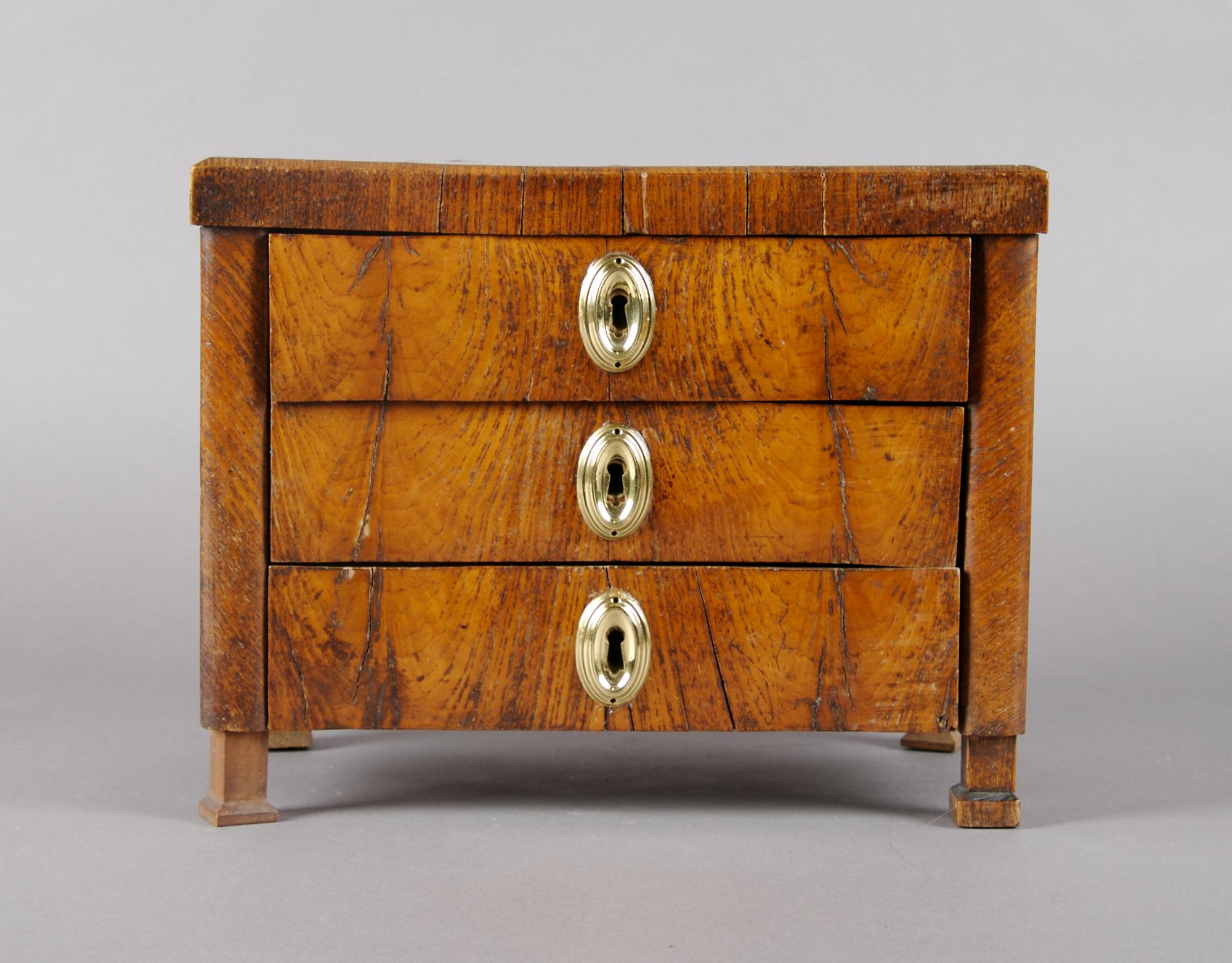A Burlwood Diminutive Chest of Drawers, Height 8 1/4 inches.