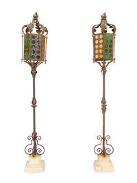 A Pair of Gilt Metal Gondola Style Floor Lamps