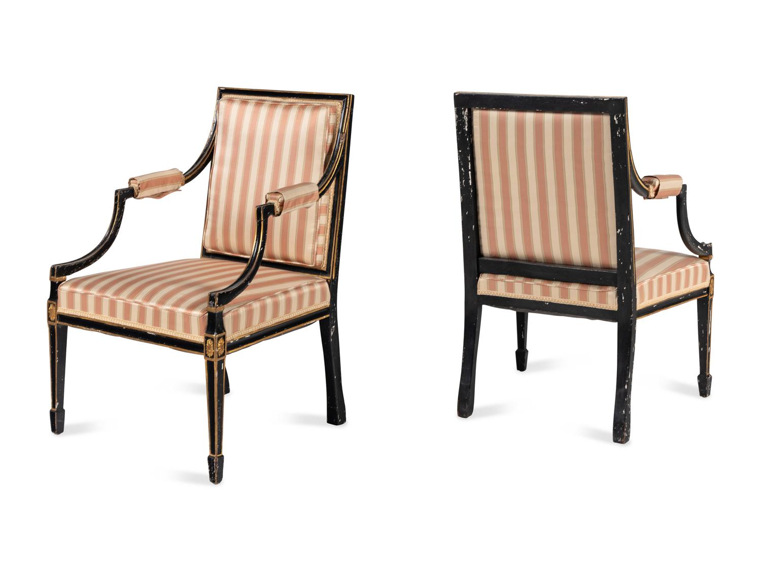 A Pair of Regency Style Ebonized and Parcel-Gilt Armchairs