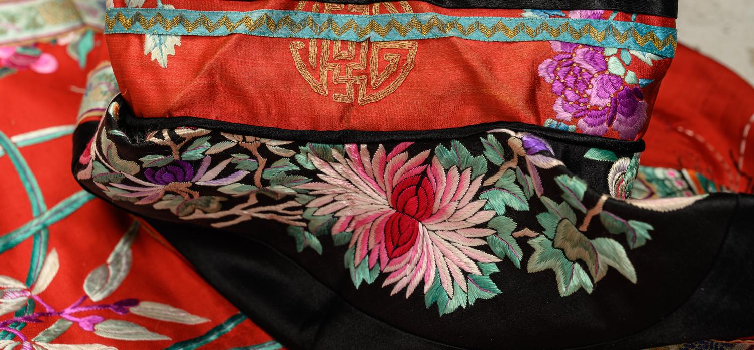 A Red Ground Embroidered Silk Manchu Lady's Robe