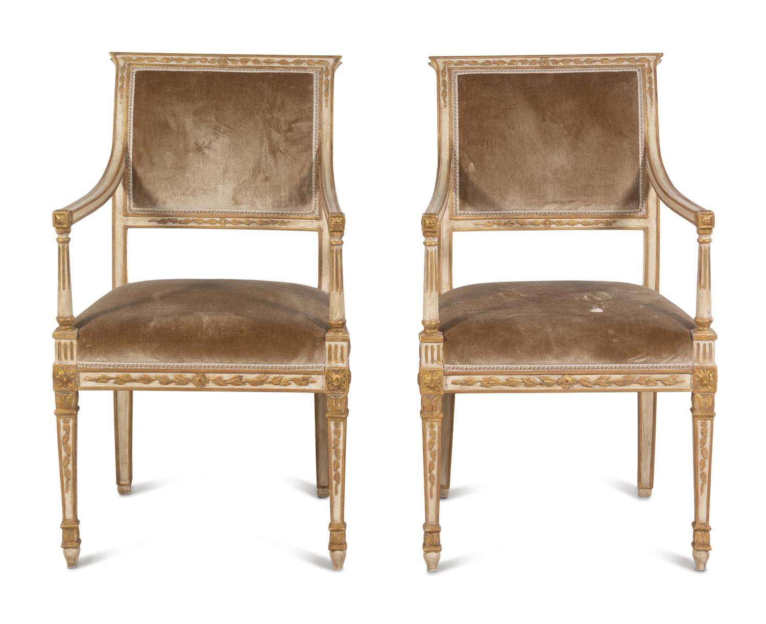 A Pair of Dennis and Leen Painted and Parcel Gilt Armchairs