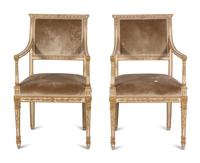 A Pair of Dennis and Leen Painted and Parcel Gilt Armchairs
