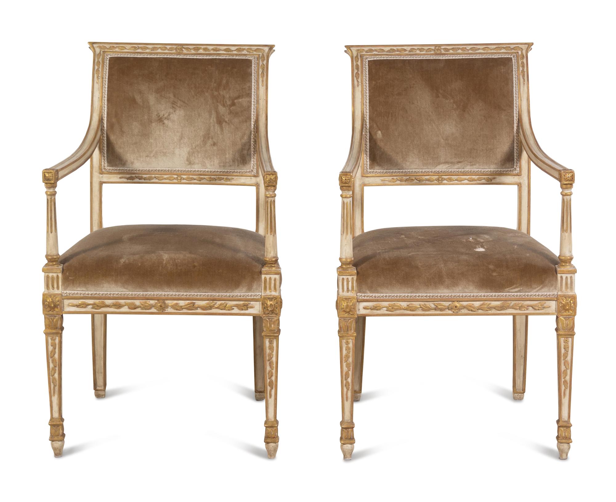 A Pair of Dennis and Leen Painted and Parcel Gilt Armchairs