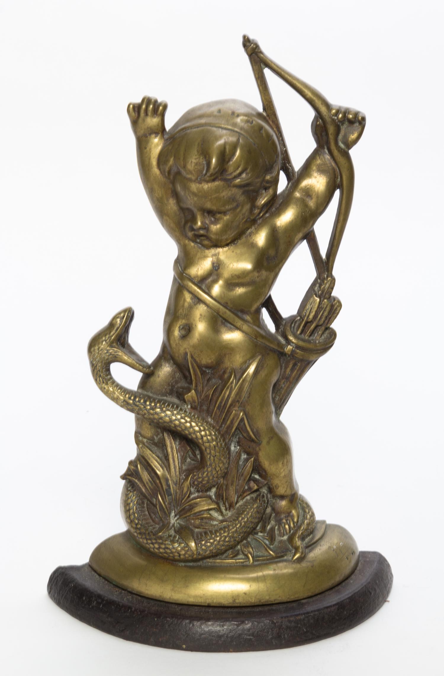 A Continental Brass Doorstop Height 16 inches.