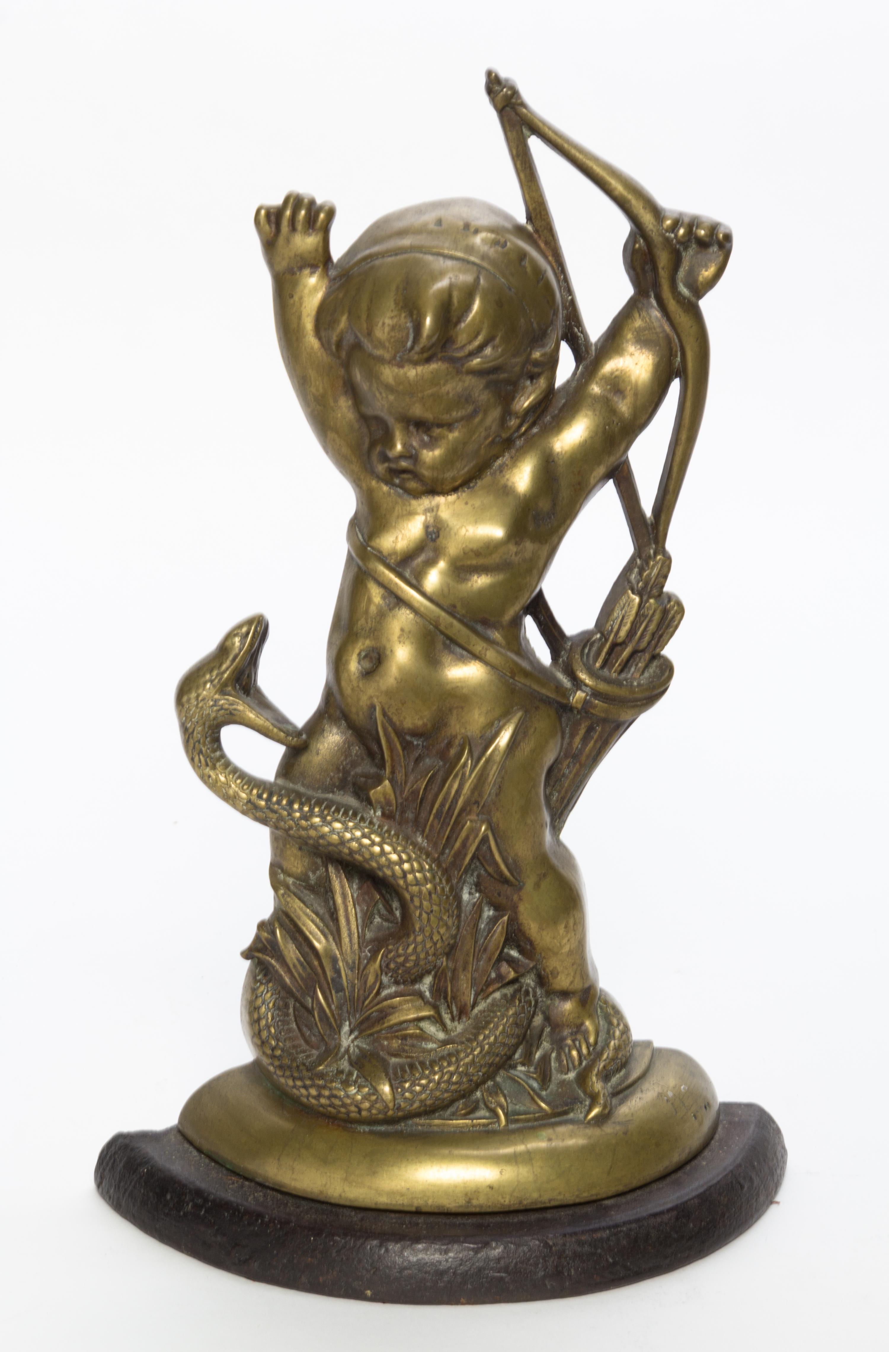 A Continental Brass Doorstop Height 16 inches.