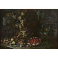 NEAPOLITAN SCHOOL (17TH CENTURY) STILL LIFE WITH FLOWERS, FRUITS AND VEGETABLES BESIDE A FOUNTAIN IN A VILLA GARDEN; TOGETHER WITH A COMPANION