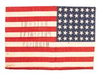 [FLAGS & PATRIOTIC TEXTILES - HARRISON, Benjamin (1833-1901)]. "Welcome President Harrison" parade flag. Ca 1889-1890.