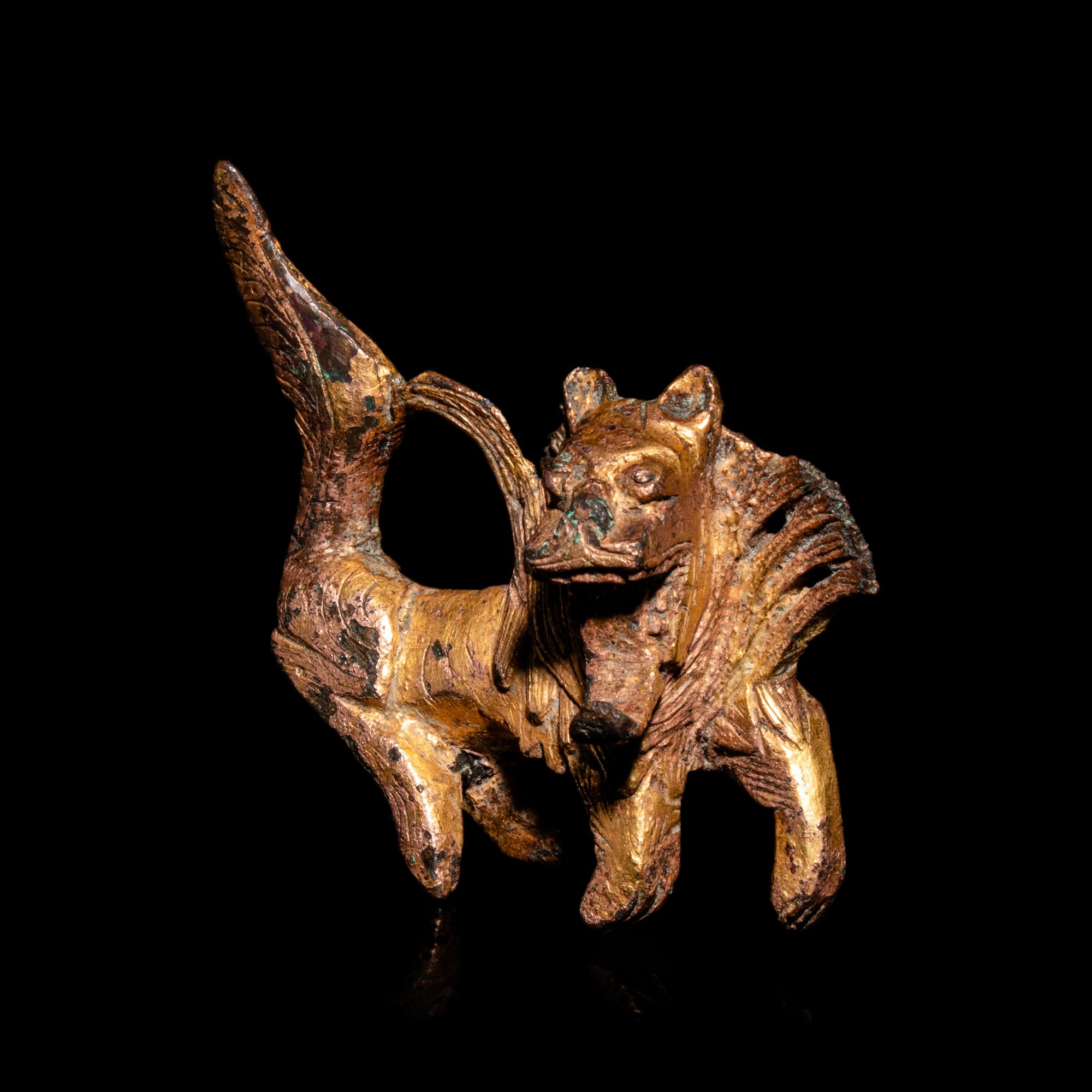 A Small Chinese Gilt Bronze Fu Lion-Form Decoration, Jin-Northern and Southern Dynasties 晉-南北朝 銅鎏金佛獅飾件