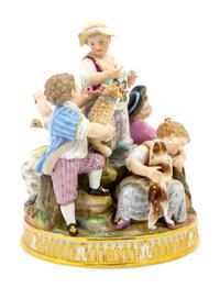 A Meissen Porcelain Figural Group of Children with Lambs and a Dog