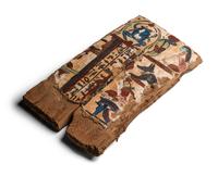 An Egyptian Painted Wood Sarcophagus Fragment with a Scarab