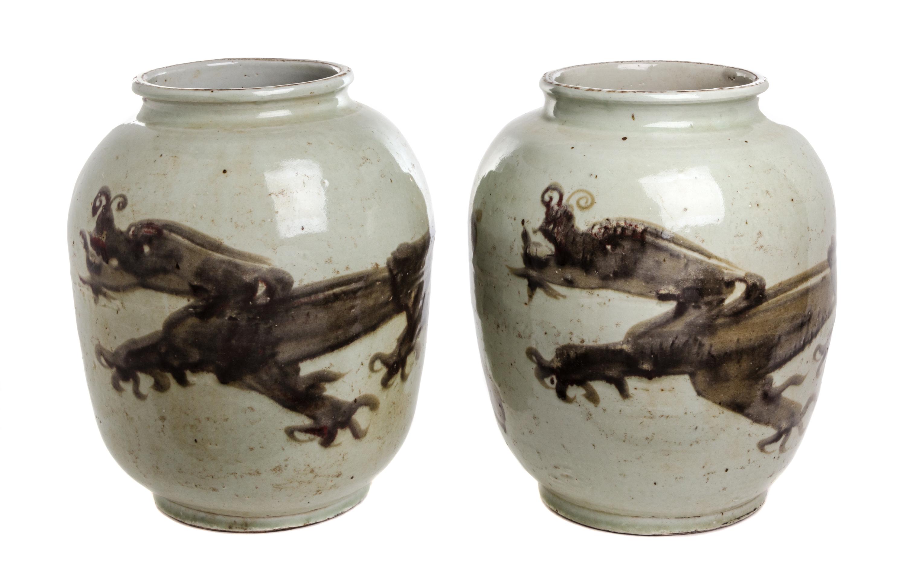A Pair of Chinese Porcelain Jars Height 14 1/4 inches. — 20TH CENTURY