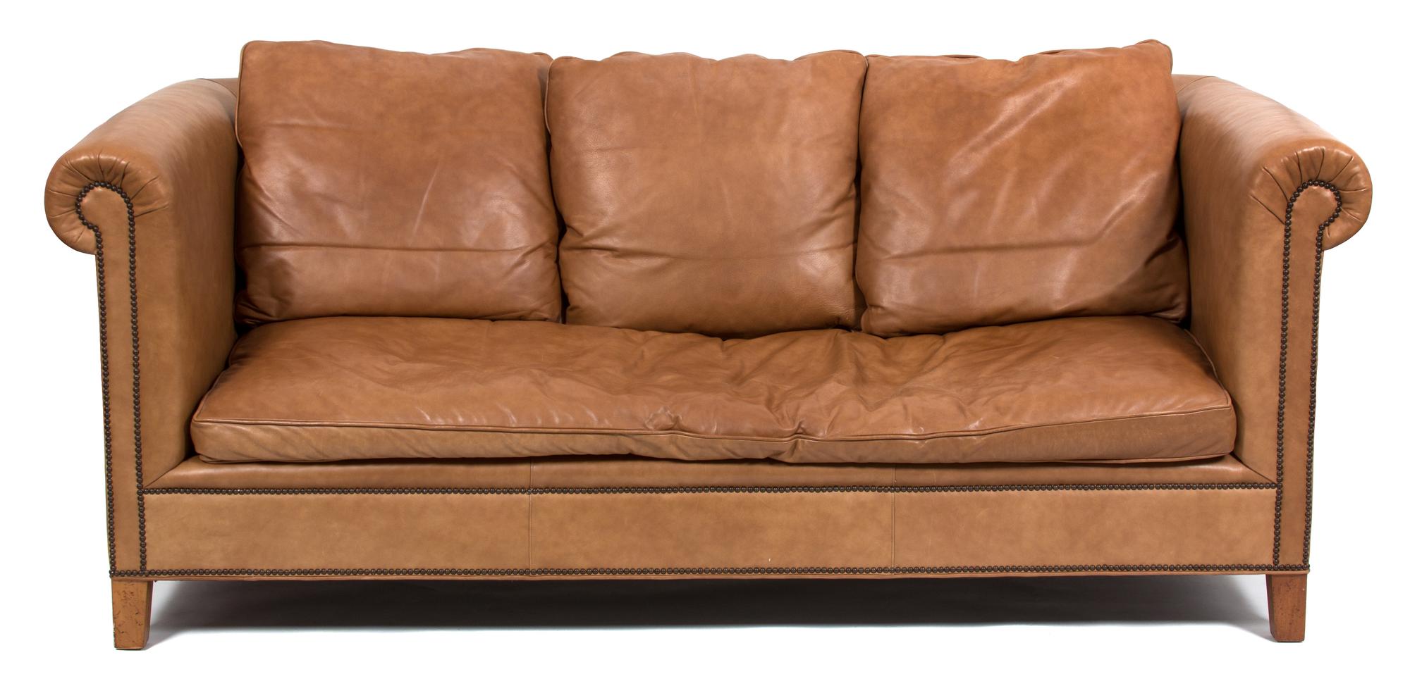 A Chesterfield Style Brown Leather Sofa — 20TH CENTURY