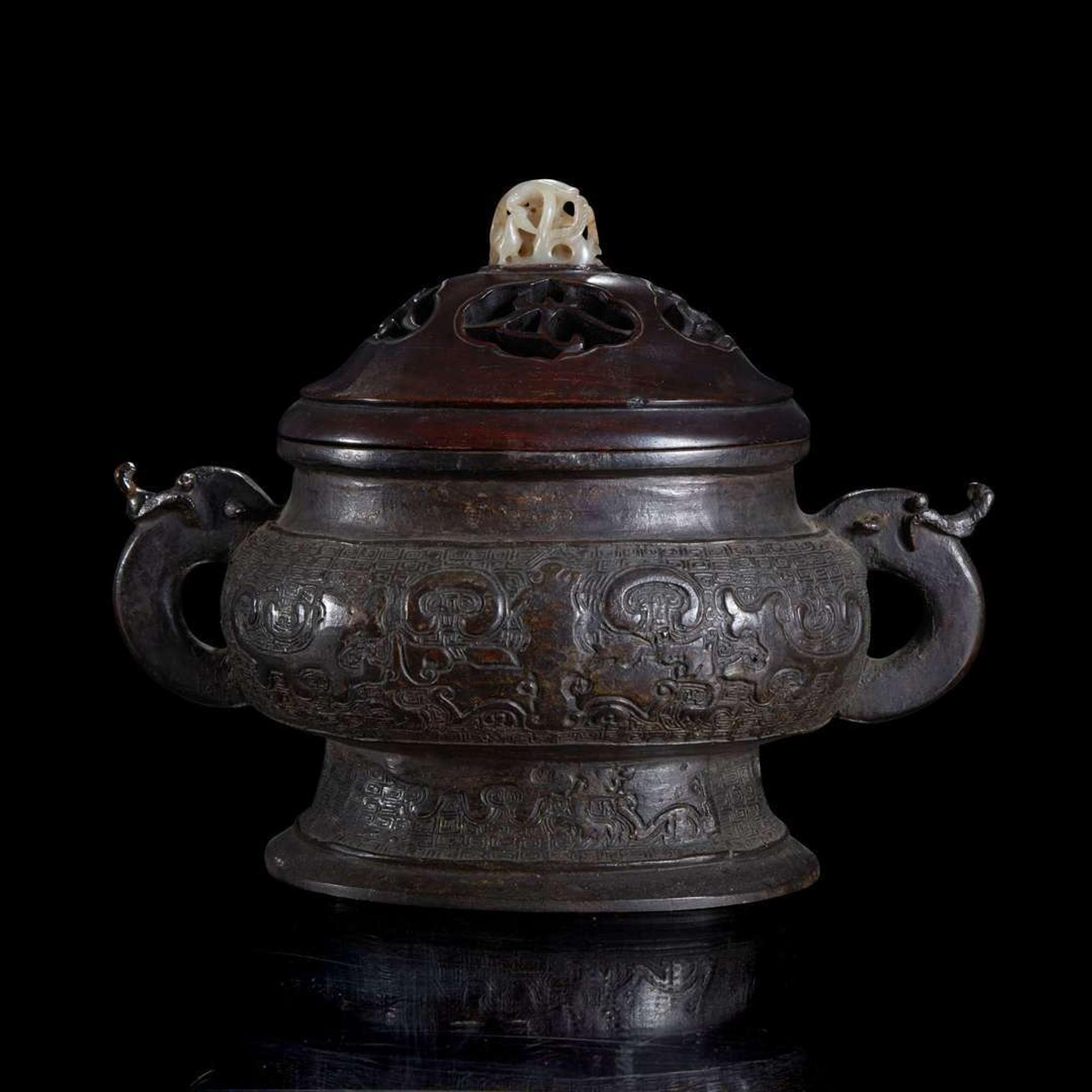 A Chinese patinated bronze vessel with wood cover and jade finial 铜香炉及嵌玉木盖 The bronze 17th/18th century or earlier ?????????????