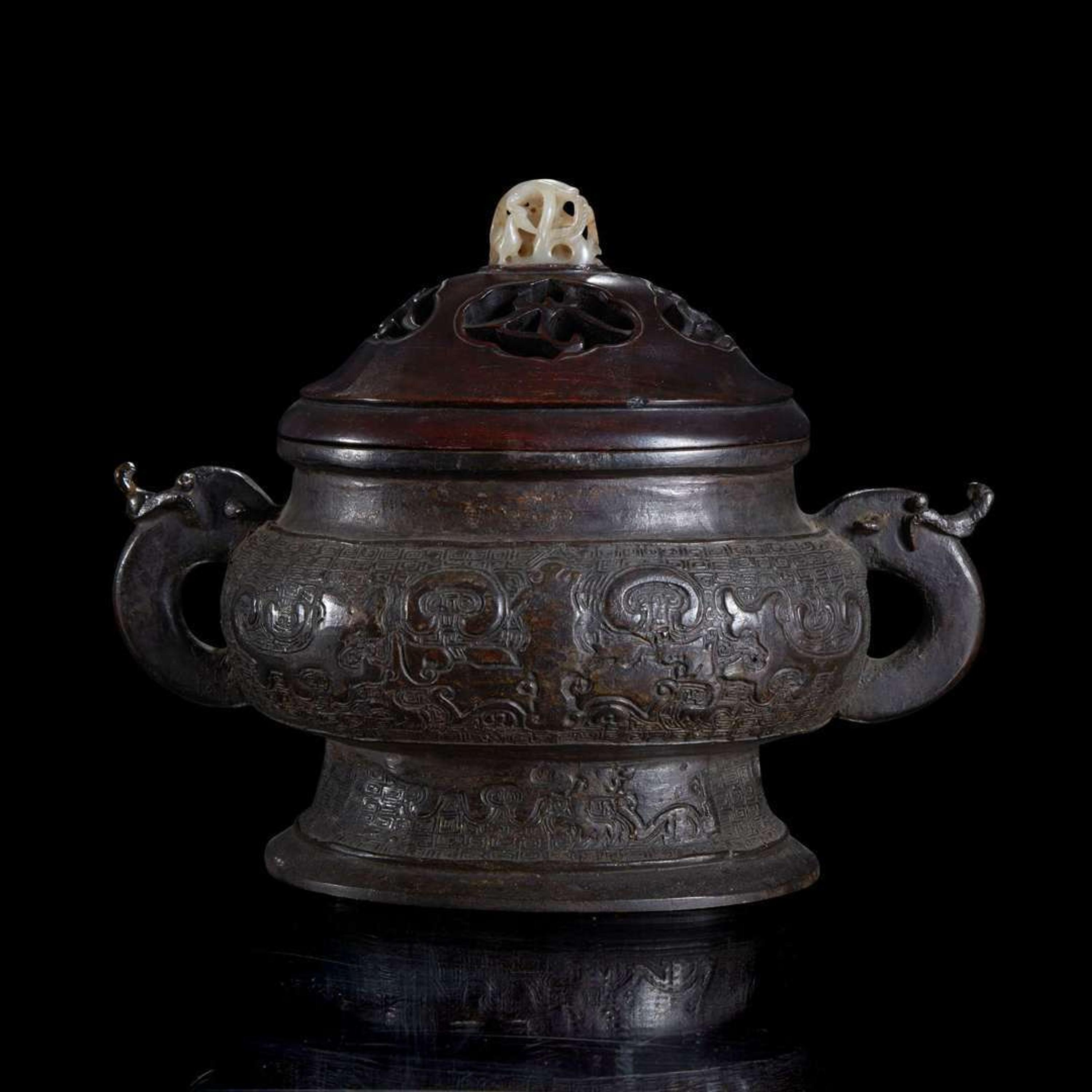 A Chinese patinated bronze vessel with wood cover and jade finial 铜香炉及嵌玉木盖 The bronze 17th/18th century or earlier ?????????????