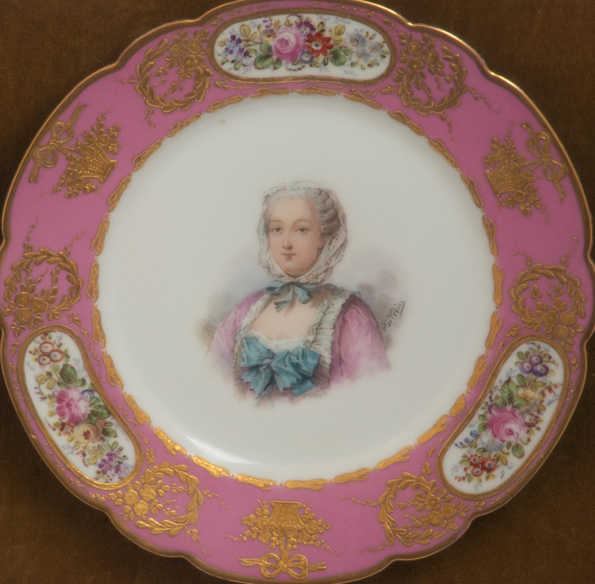 A Group of Seven Framed Sèvres Style Porcelain Plates