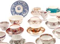 A Large Collection of English Porcelain Teacups and Saucers