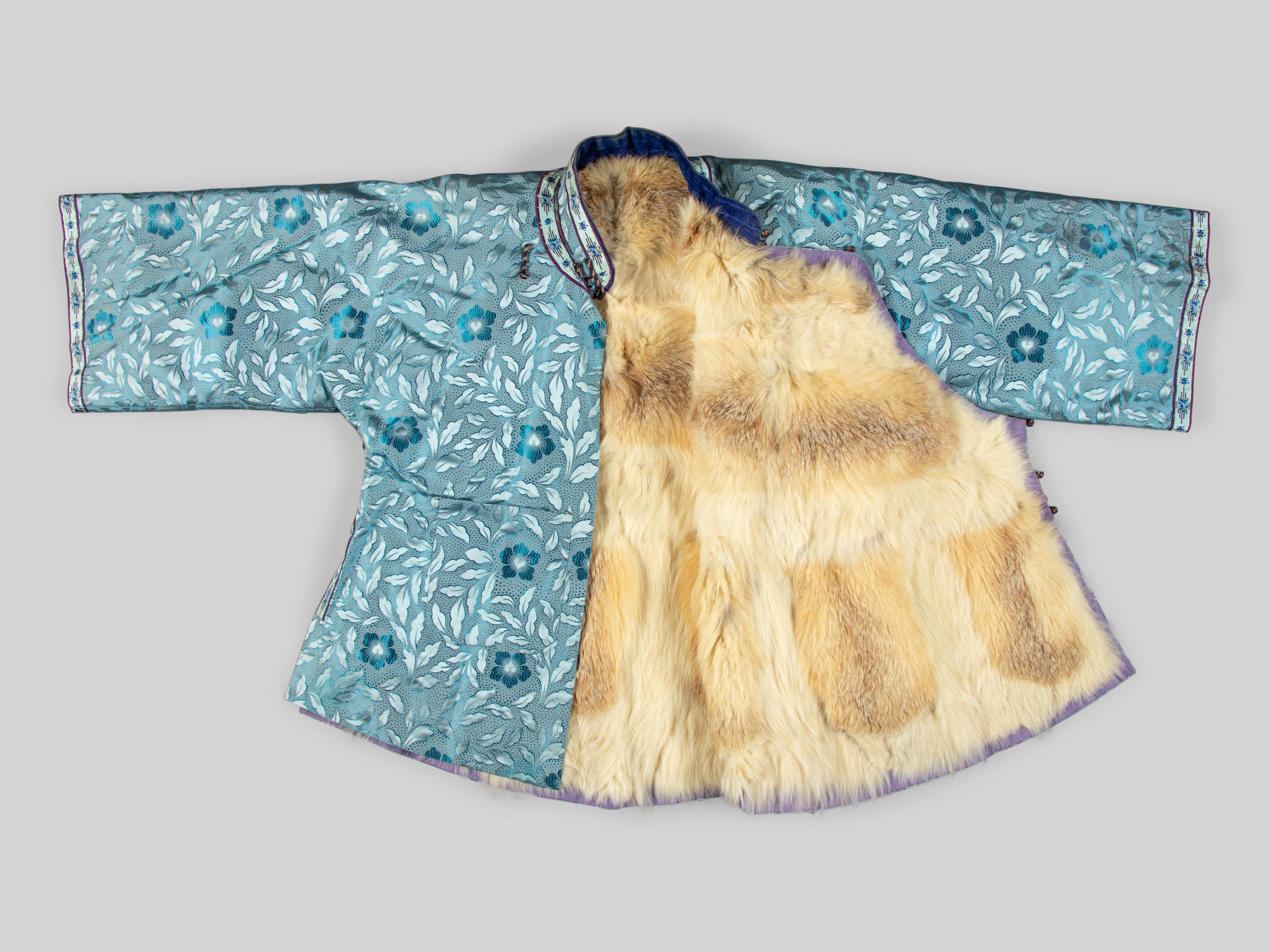A Fur Lined Light Blue Silk Ladie's Jacket