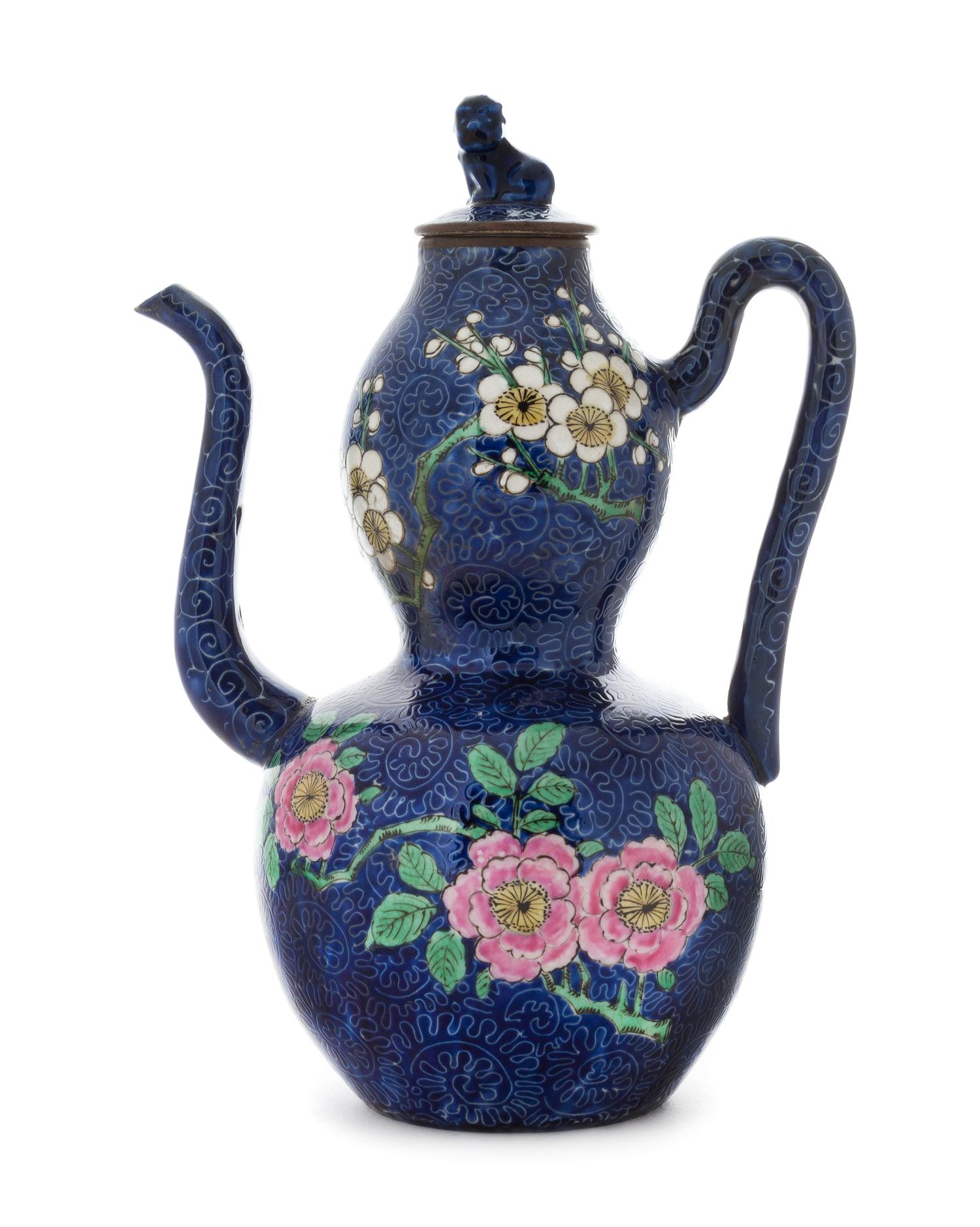 A Famille Rose Porcelain Teapot Height 10 inches.