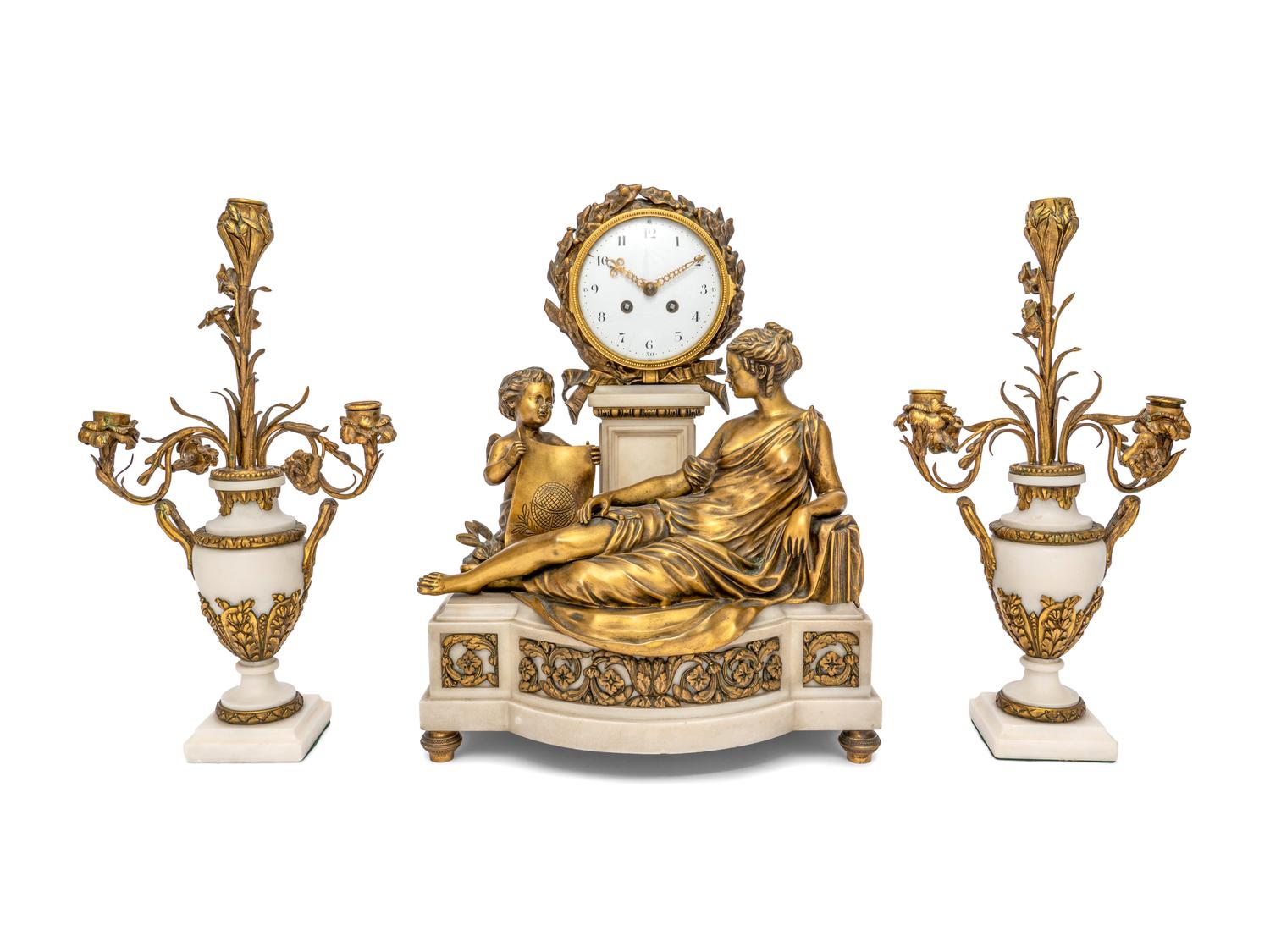 A French Gilt Bronze and Marble Clock Garniture