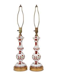 A Pair of Bohemian Enameled White Overlay Ruby Glass Lamps