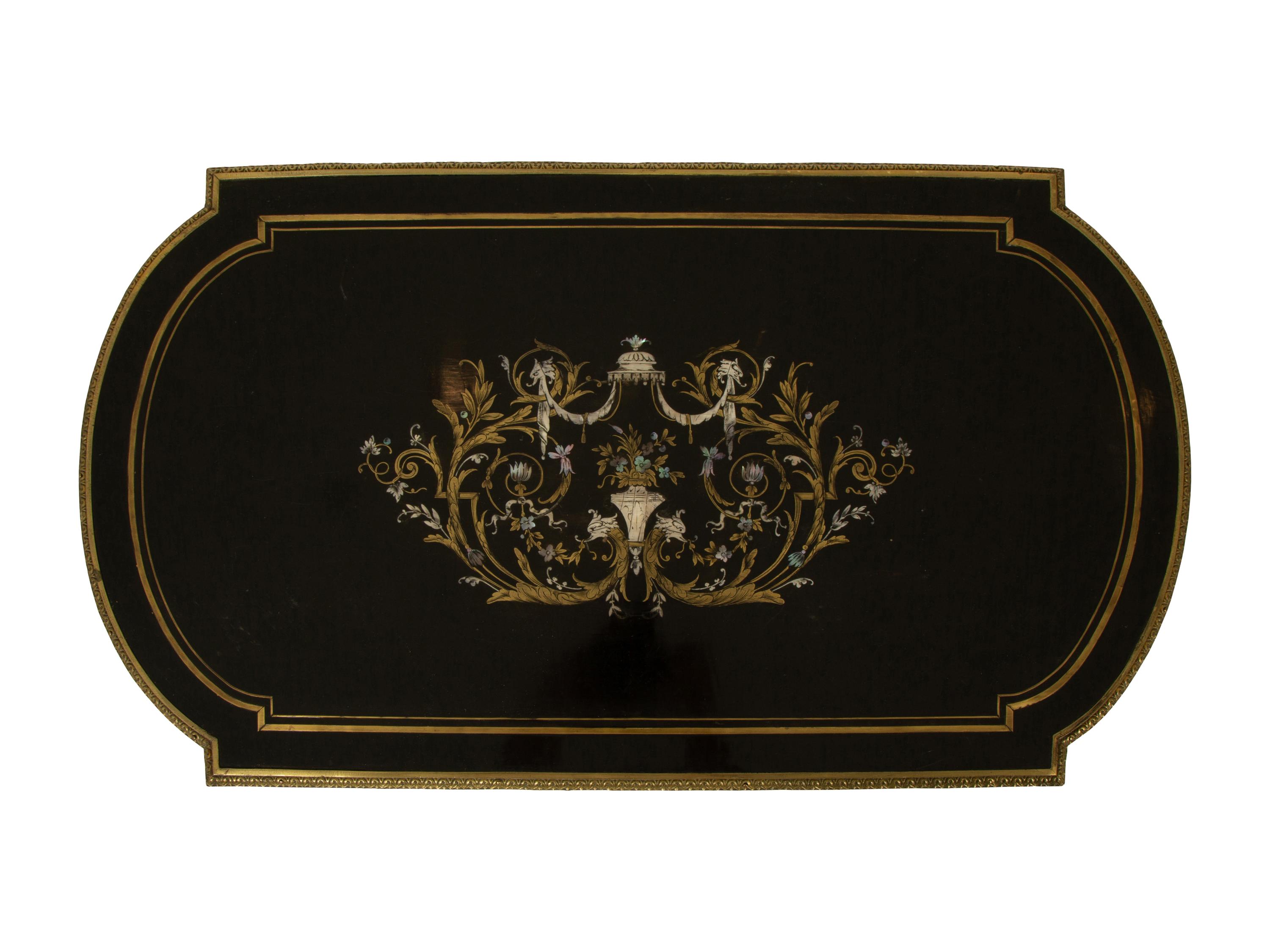 A Napoleon III Pewter and Brass Inlaid Ebonized Dressing Table — CIRCA 1870