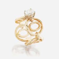 A diamond and gold ring