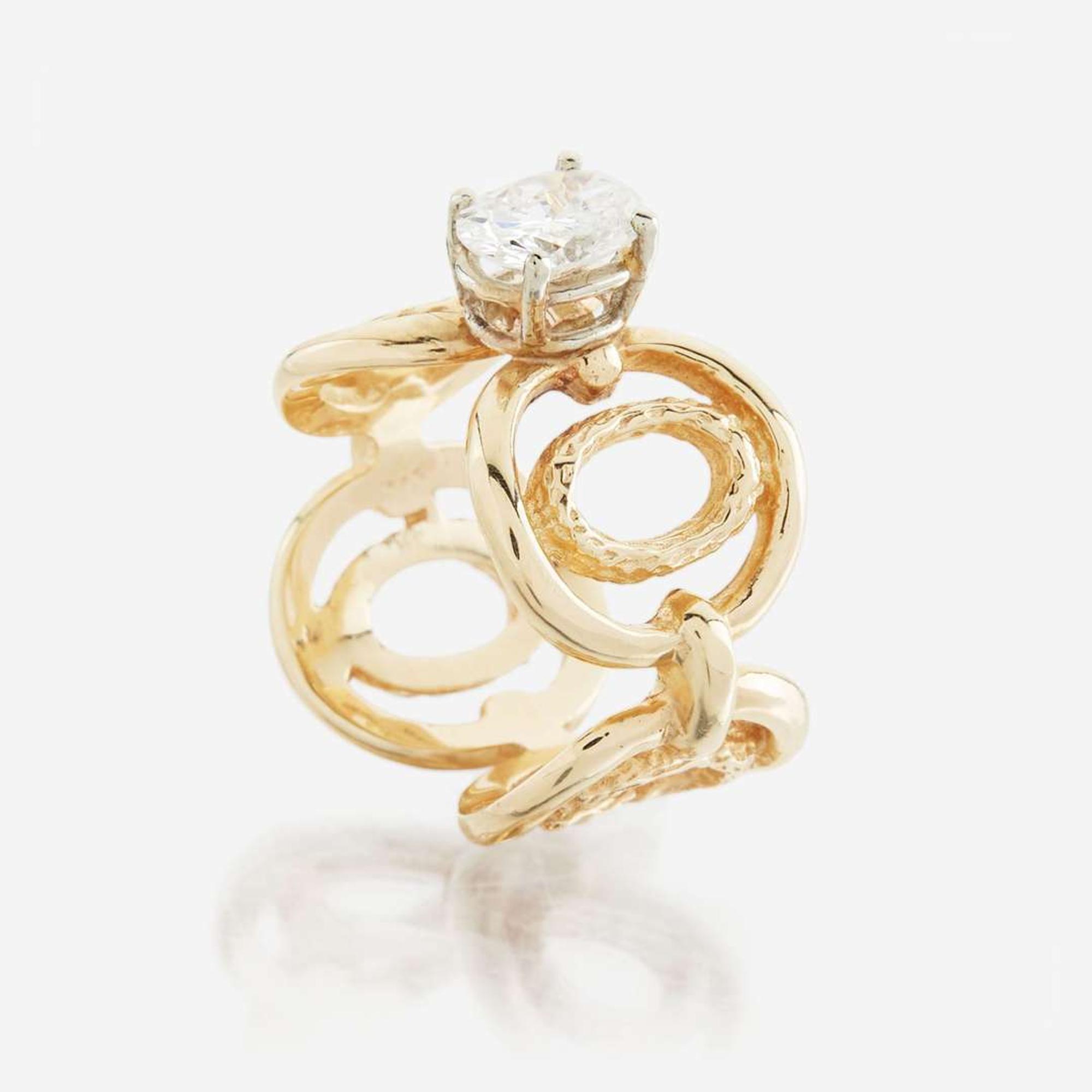 A diamond and gold ring